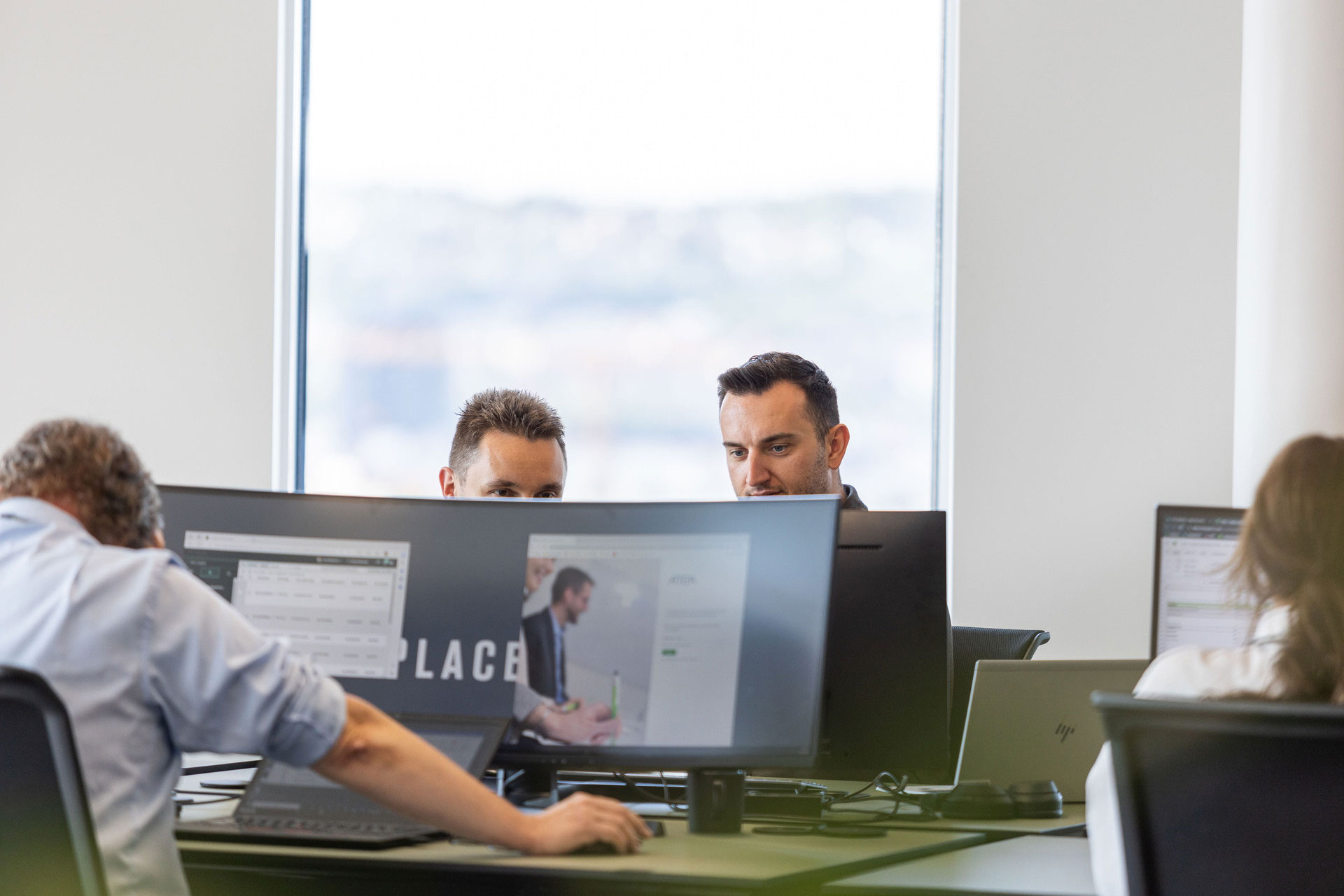 Office With People Working On PC At Their Desks