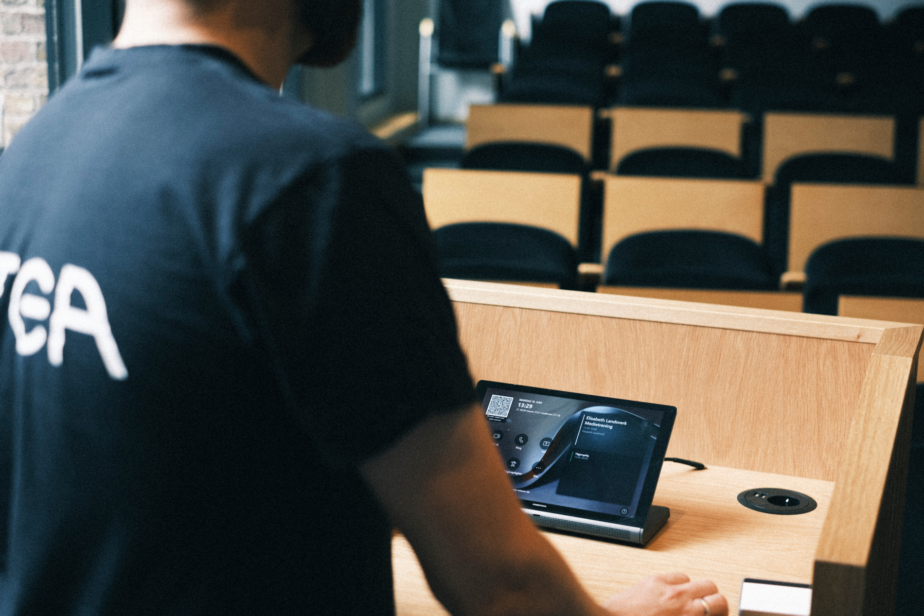 Atea employee In Auditorium