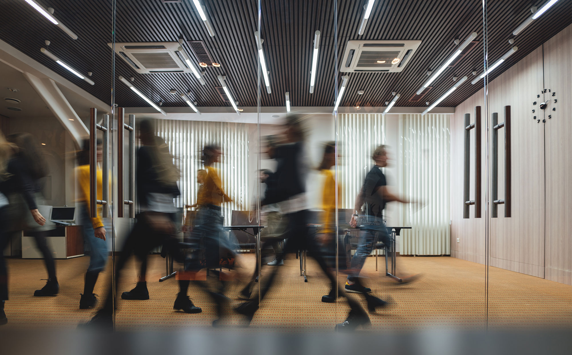 people walking fast in different directions